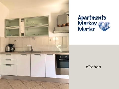 Kitchen or kitchenette, dishwasher, oven, stove, toaster