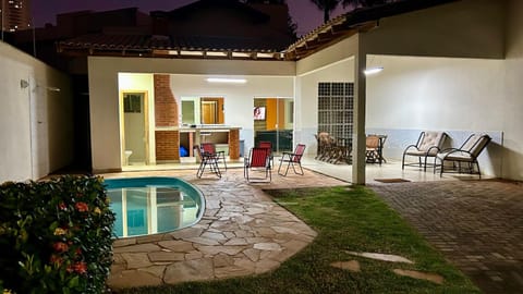 Property building, Patio, BBQ facilities, Garden, Bathroom, Seating area, Pool view, Swimming pool, Swimming pool