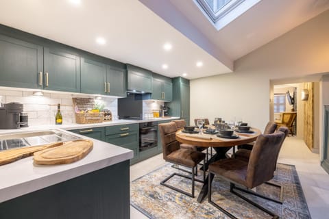 Kitchen or kitchenette, Seating area, Dining area, dishwasher, oven, stove, toaster