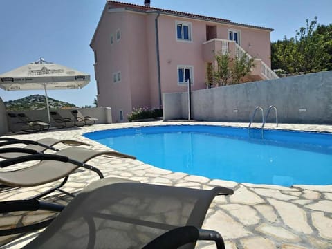 Property building, Patio, Swimming pool, Swimming pool