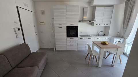 Kitchen or kitchenette, Living room, Dining area, oven, stove