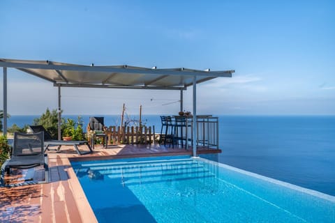 Property building, Living room, Swimming pool