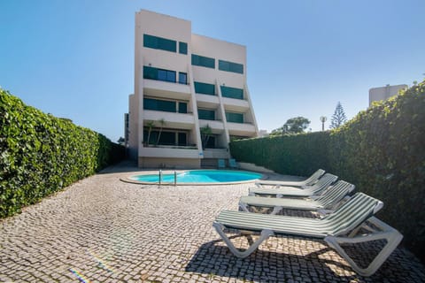 Property building, Living room, Swimming pool