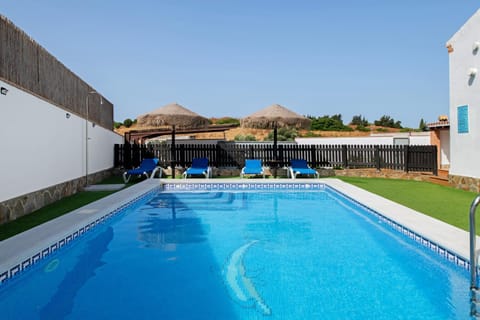 Property building, Living room, Swimming pool