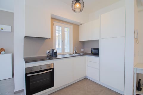 Kitchen or kitchenette, oven, stove