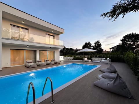 Property building, Patio, Facade/entrance, Off site, Balcony/Terrace, Pool view, Swimming pool, sunbed