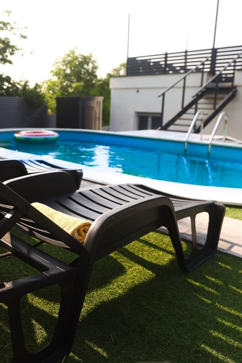 Swimming pool, sunbed