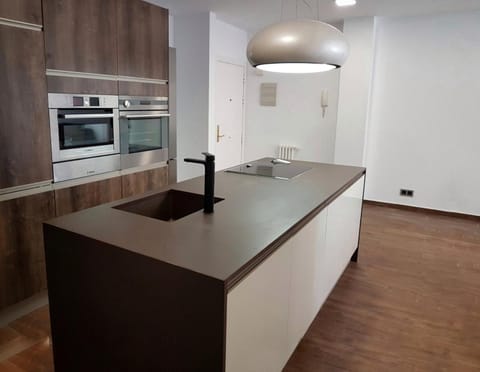 Kitchen or kitchenette, oven, stove