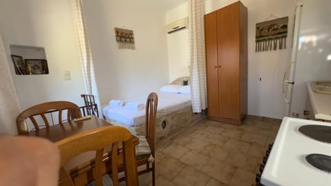 Bed, Kitchen or kitchenette, Bedroom, wardrobe, air conditioner