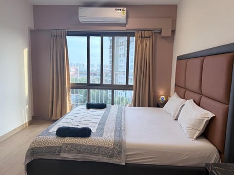 Bed, Photo of the whole room, Bedroom, towels, air conditioner