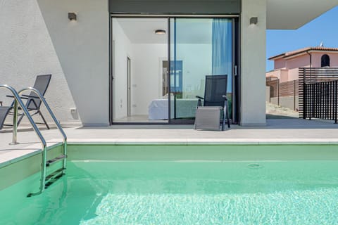 Property building, Living room, Swimming pool