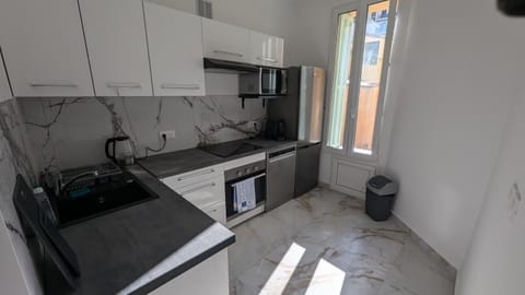 Kitchen or kitchenette, dishwasher, oven, stove, washing machine, kitchen