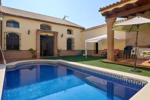 Property building, Living room, Swimming pool
