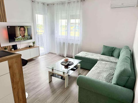 TV and multimedia, Living room, Seating area, air conditioner