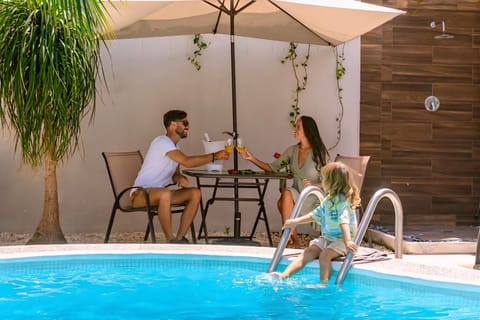 Patio, Day, Dining area, Pool view, Swimming pool