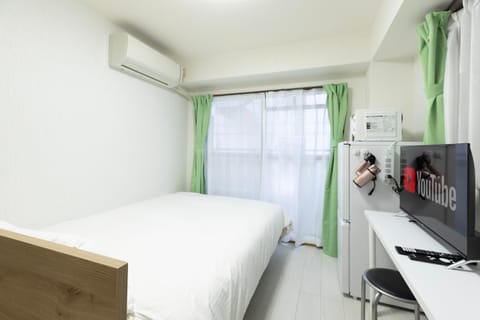 Bed, TV and multimedia, Photo of the whole room