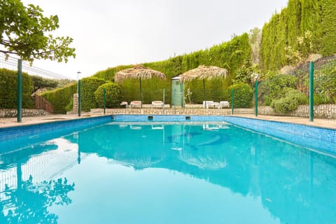 Property building, Living room, Swimming pool