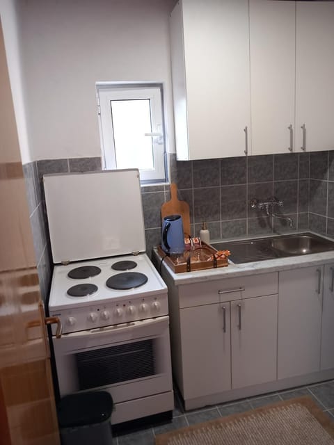 Kitchen or kitchenette, stove