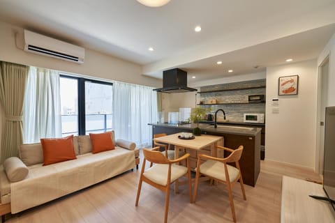 Kitchen or kitchenette, Living room, Seating area, Dining area, air conditioner