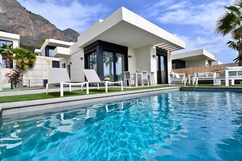 Property building, Day, Natural landscape, Mountain view, Pool view, Swimming pool, sunbed