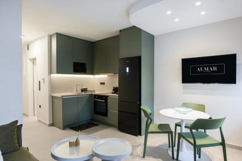TV and multimedia, Living room, Dining area, microwave, oven, stove, kitchen