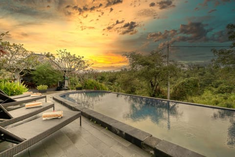 Natural landscape, Garden view, Pool view, Swimming pool, sunbed, towels