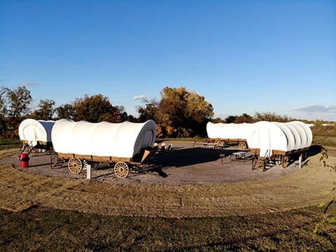 Oklahoma Glamping in this Wonderful Covered Wagon for Family Vacations near Oklahoma City House in Norman