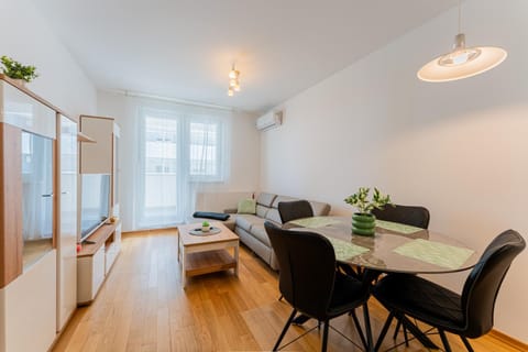 Property building, View (from property/room), Living room, Seating area, Dining area