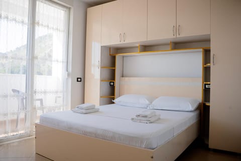 Bed, Photo of the whole room, Bedroom, towels, wardrobe