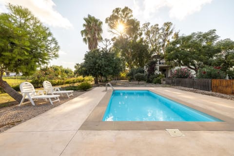 Property building, Living room, Swimming pool