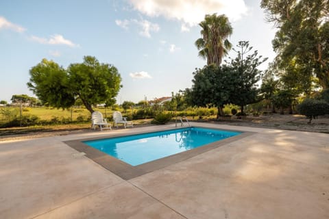 Property building, Living room, Swimming pool