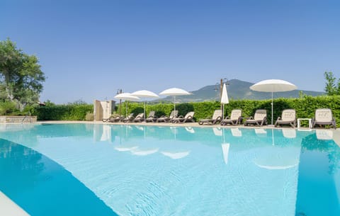 Property building, Living room, Swimming pool