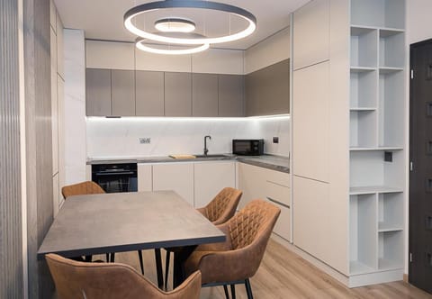 Kitchen or kitchenette, Living room, Seating area, Dining area, stove