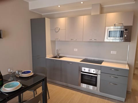 Dining area, dishwasher, oven, stove