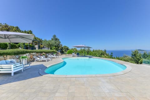 Property building, Living room, Swimming pool