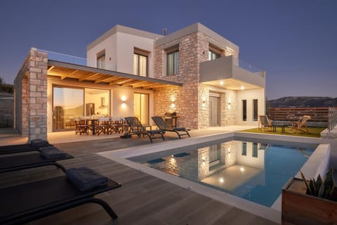Property building, Patio, Night, Balcony/Terrace, Pool view, Swimming pool, sunbed