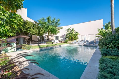Property building, Living room, Swimming pool