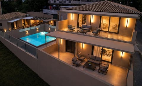 Property building, Patio, Night, Balcony/Terrace, Pool view, Swimming pool, sunbed