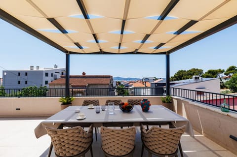 Property building, Patio, Day, View (from property/room), Balcony/Terrace, Balcony/Terrace, Seating area, Dining area
