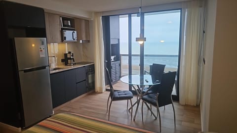 Natural landscape, Kitchen or kitchenette, Seating area, Dining area, Sea view