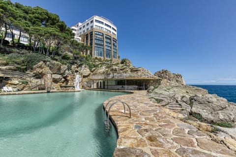 Property building, Living room, Swimming pool