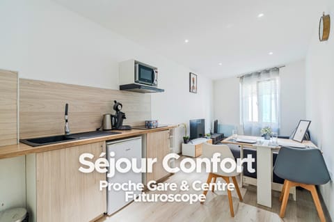 Coffee/tea facilities, Kitchen or kitchenette, Living room, Dining area, Text overlay, microwave