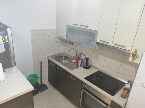 Kitchen or kitchenette, oven, stove