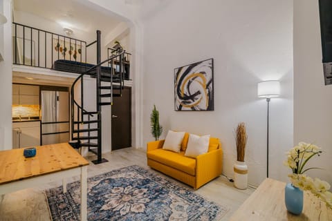Bed, Living room, Seating area, Bedroom