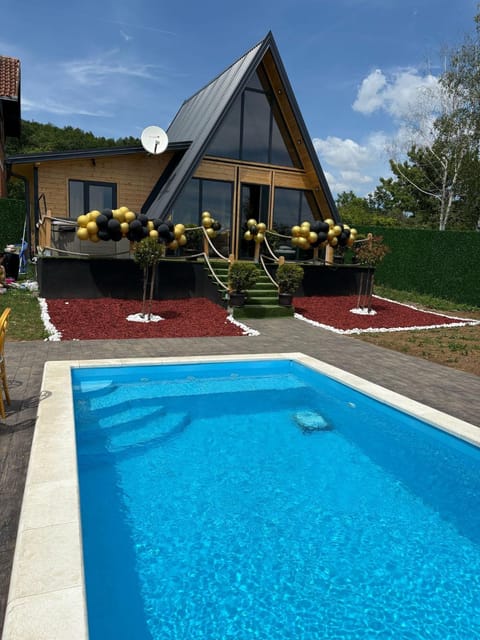 Property building, Day, Pool view, Swimming pool, sunbed