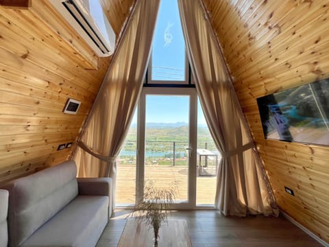 Natural landscape, View (from property/room), Balcony/Terrace, Living room, Seating area, Sea view