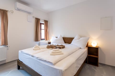 Bed, Photo of the whole room, Bedroom, towels, air conditioner