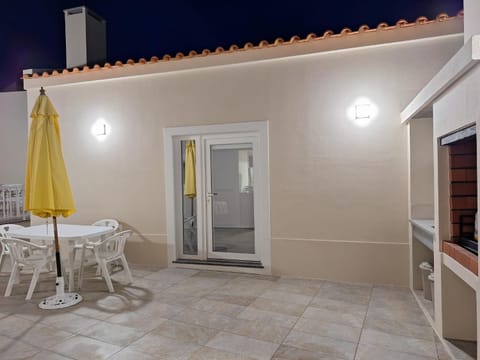 Property building, Patio, Night, View (from property/room), Dining area