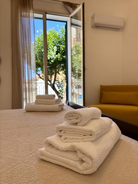 Bed, Bedroom, towels, air conditioner