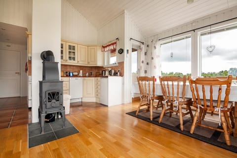 View (from property/room), Kitchen or kitchenette, Dining area, fireplace